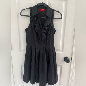 Ruffle top black dress with pockets